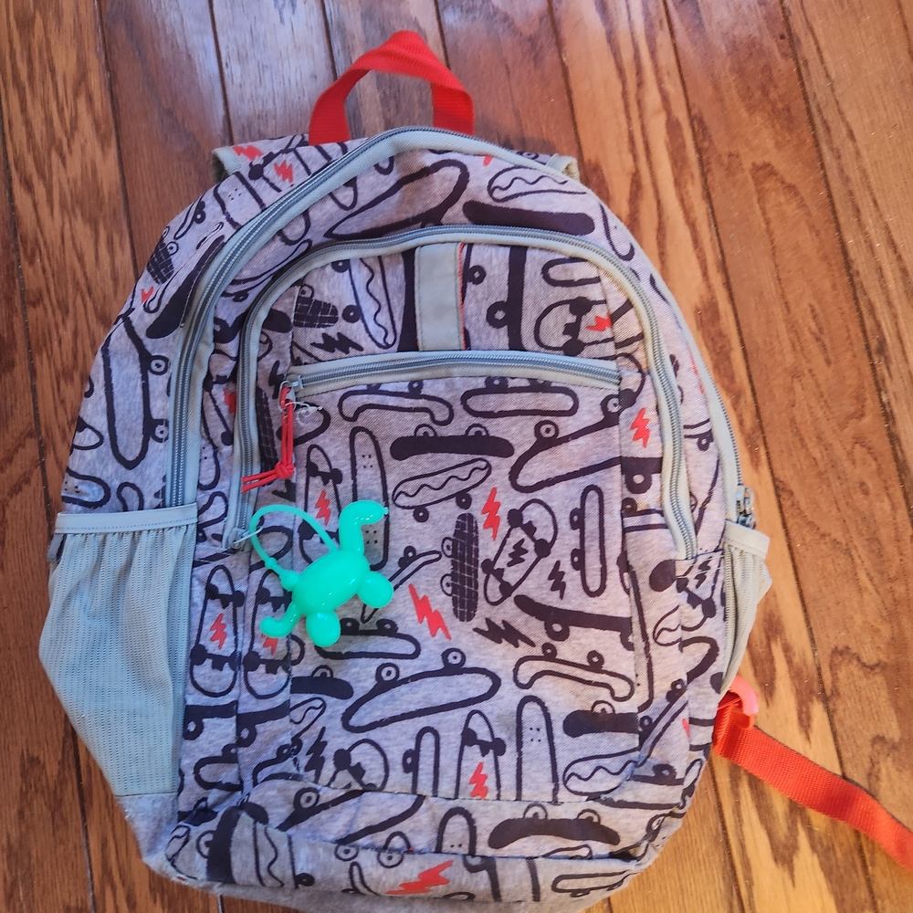 Gray and Red Kids Skateboard Backpack with Dinosaur Hand Sanitizer Charm Holder